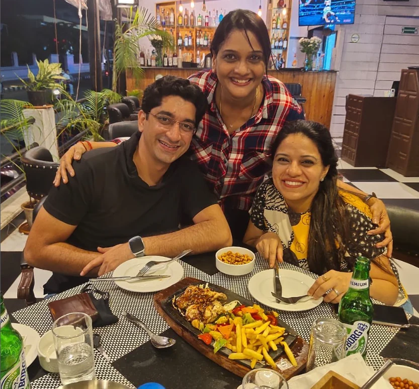 A table of three, mid-meal
